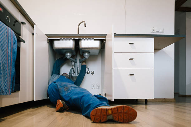 Professional Emergency Plumber technician working in Saint Michael, MN